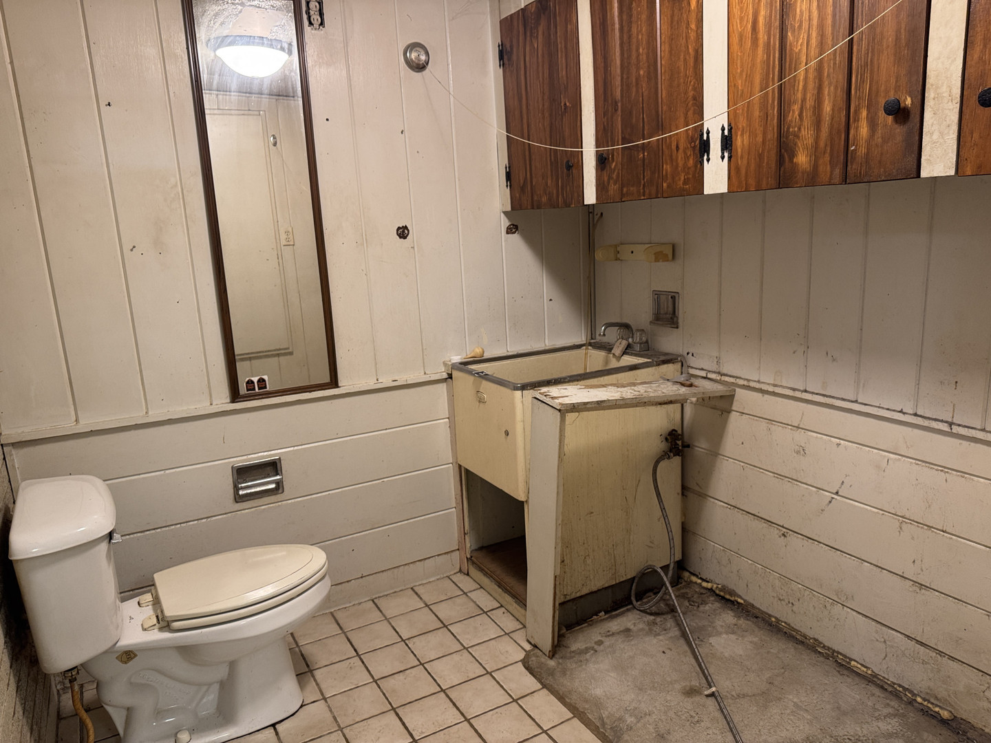 2024 Montague Road Rockford, IL 61102 - Photo 20 of 34 a bathroom with a toilet and a sink