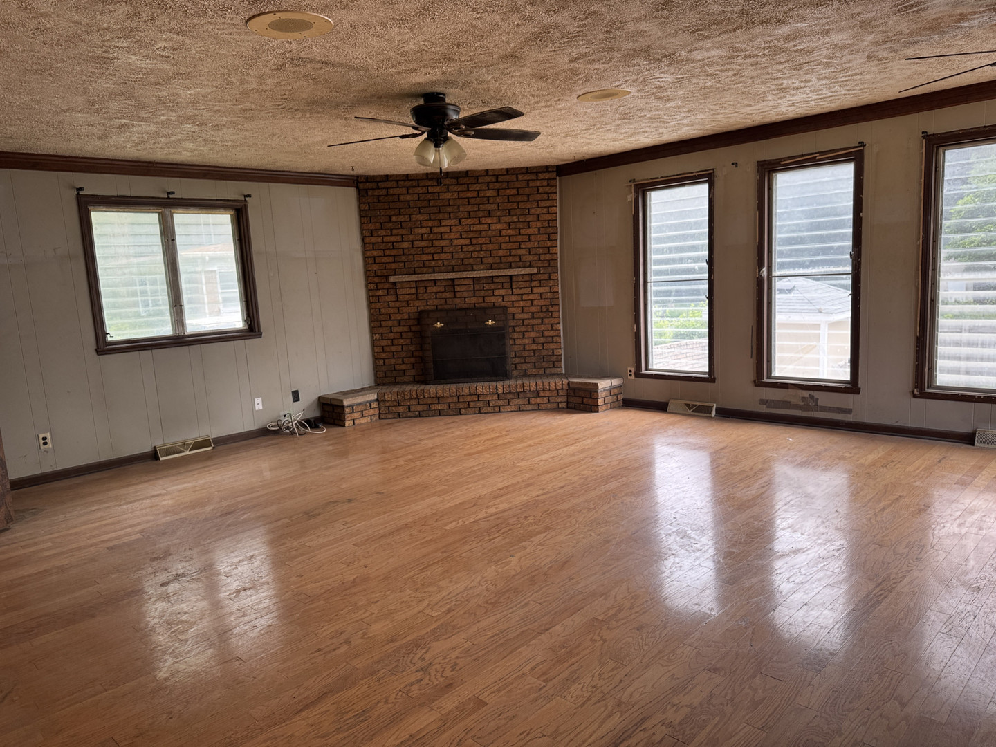 2024 Montague Road Rockford, IL 61102 - Photo 21 of 34 a view of an empty room with a window and wooden floor