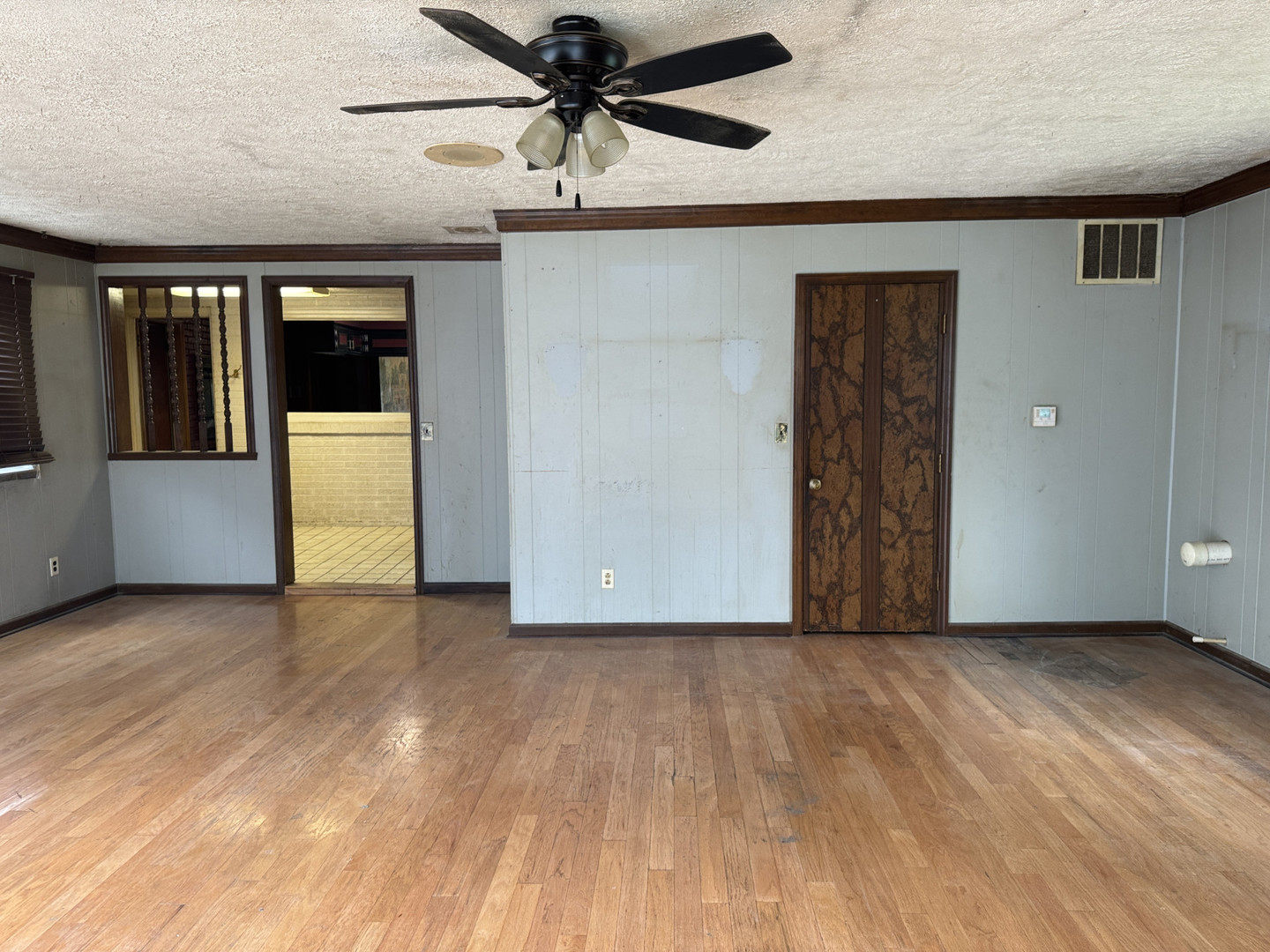 2024 Montague Road Rockford, IL 61102 - Photo 23 of 34 en empty room with wooden floor and windows