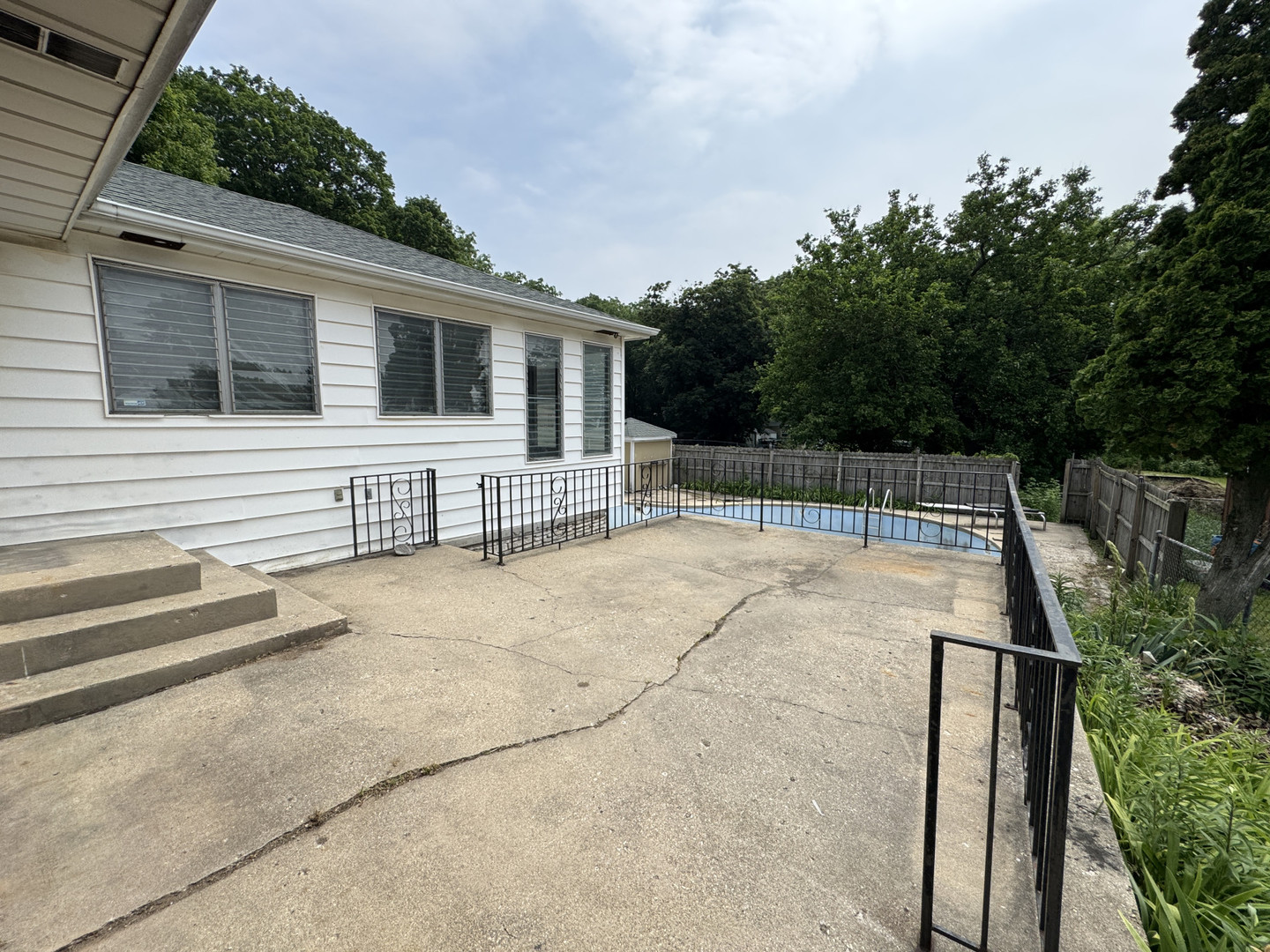 2024 Montague Road Rockford, IL 61102 - Photo 3 of 34 a view of house with backyard and deck