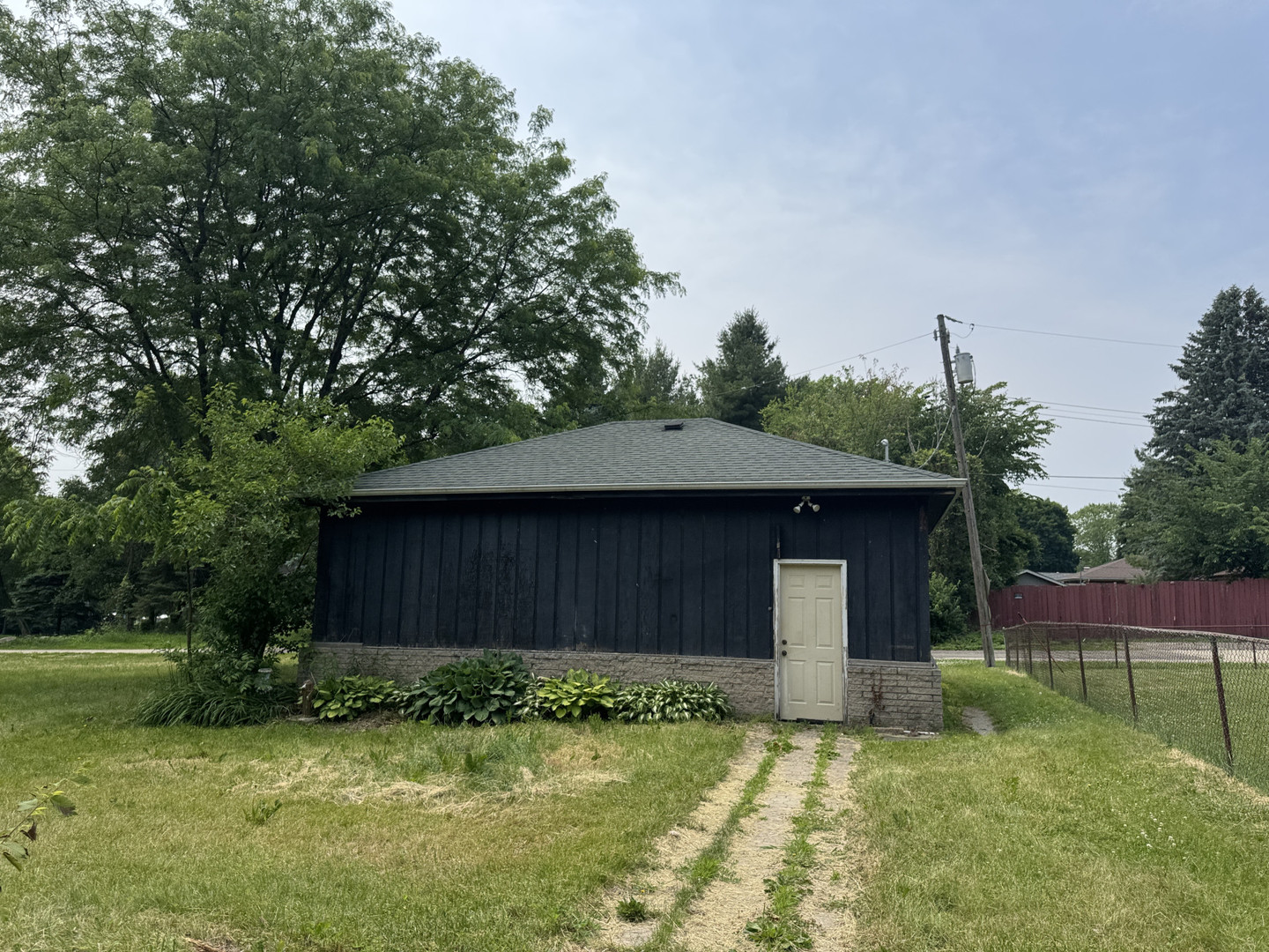 2024 Montague Road Rockford, IL 61102 - Photo 4 of 34 a front view of a house with garden