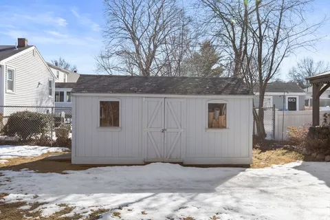 a view of a house with a snow