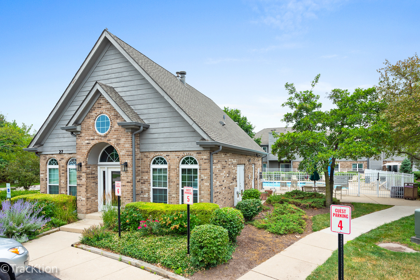 31 Foxcroft Road, Unit 207 Naperville, IL 60565 - Photo 5 of 6 a front view of a house with porch