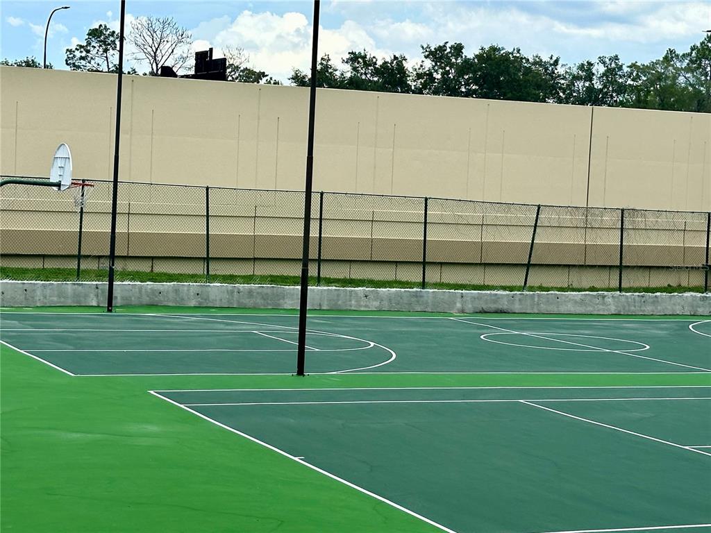 435 Wymore Road, Unit 207 Altamonte Springs, FL 32714 - Photo 12 of 17 a view of a tennis court