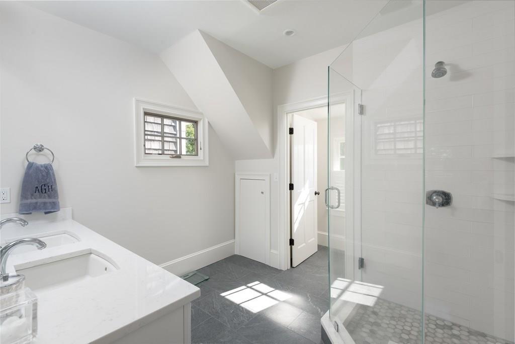 44 Middle Street Hingham, MA 02043 - Photo 15 of 23 a bathroom with a sink and a shower