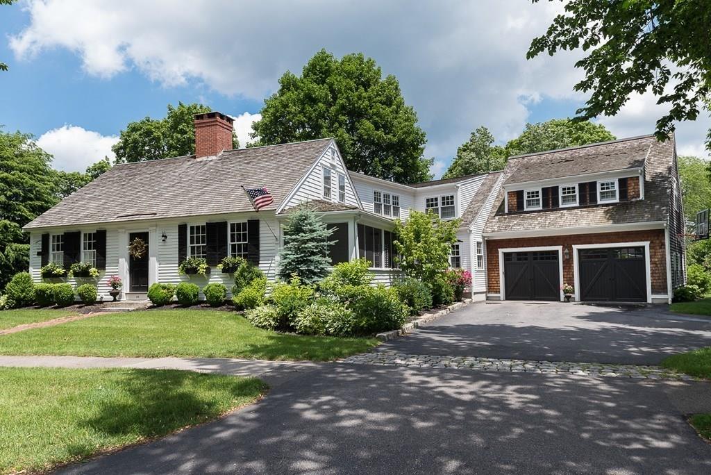 44 Middle Street Hingham, MA 02043 - Photo 2 of 23 a front view of a house with a garden