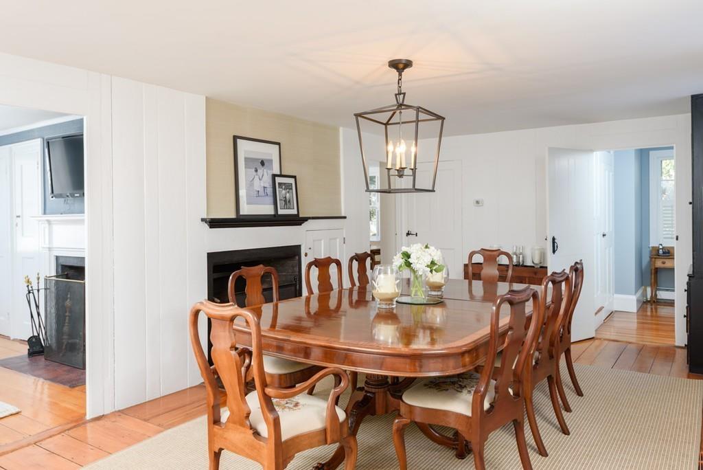 44 Middle Street Hingham, MA 02043 - Photo 8 of 23 a view of a dining room with furniture and chandelier