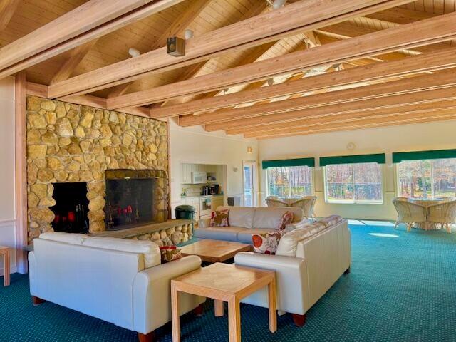 42 Eventide Lane Hyannis, MA 02601 - Photo 36 of 39 a living room with furniture and a fireplace