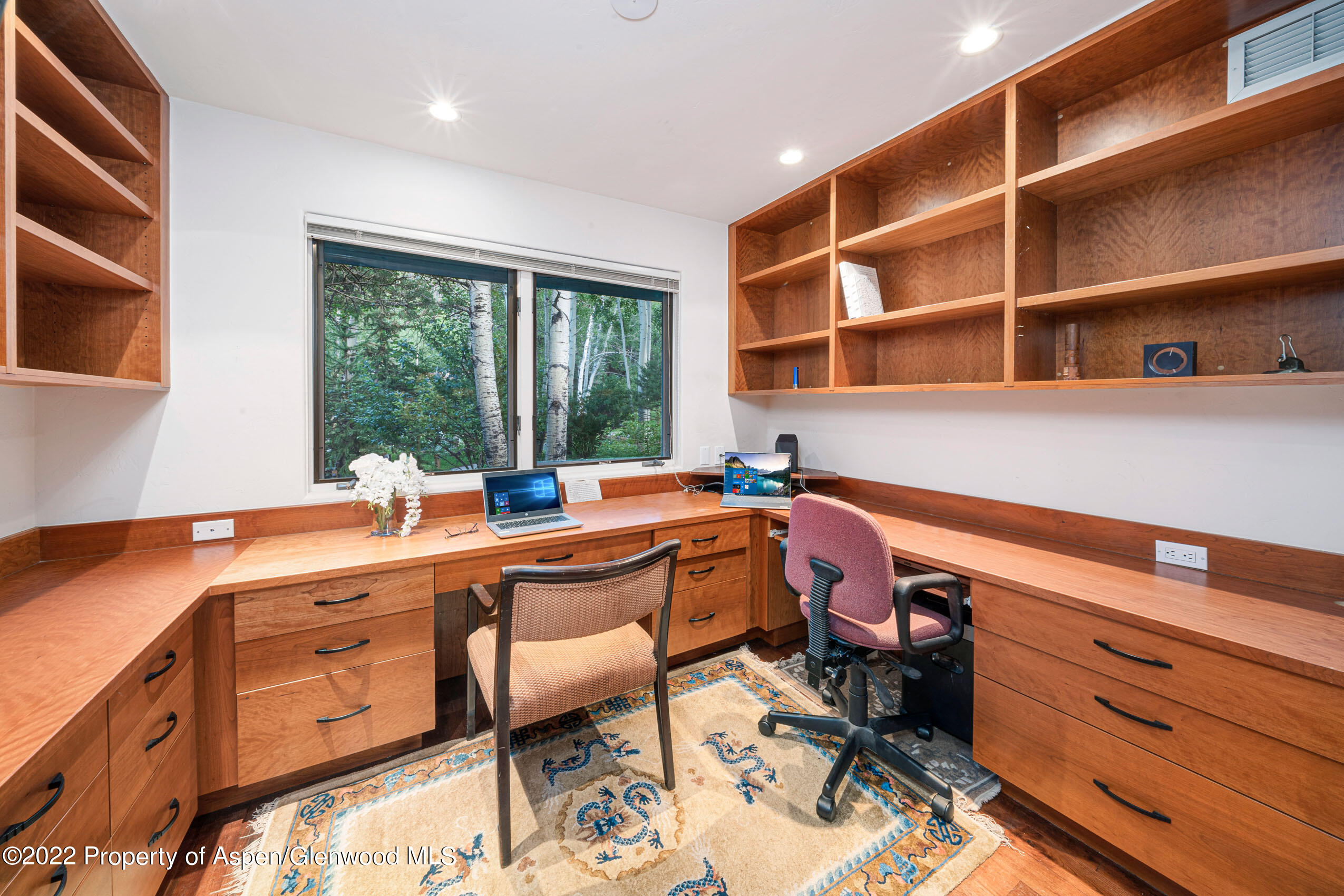61 Primrose Path Aspen, CO 81611 - Photo 11 of 48 a very nice looking room with a large window and a chair