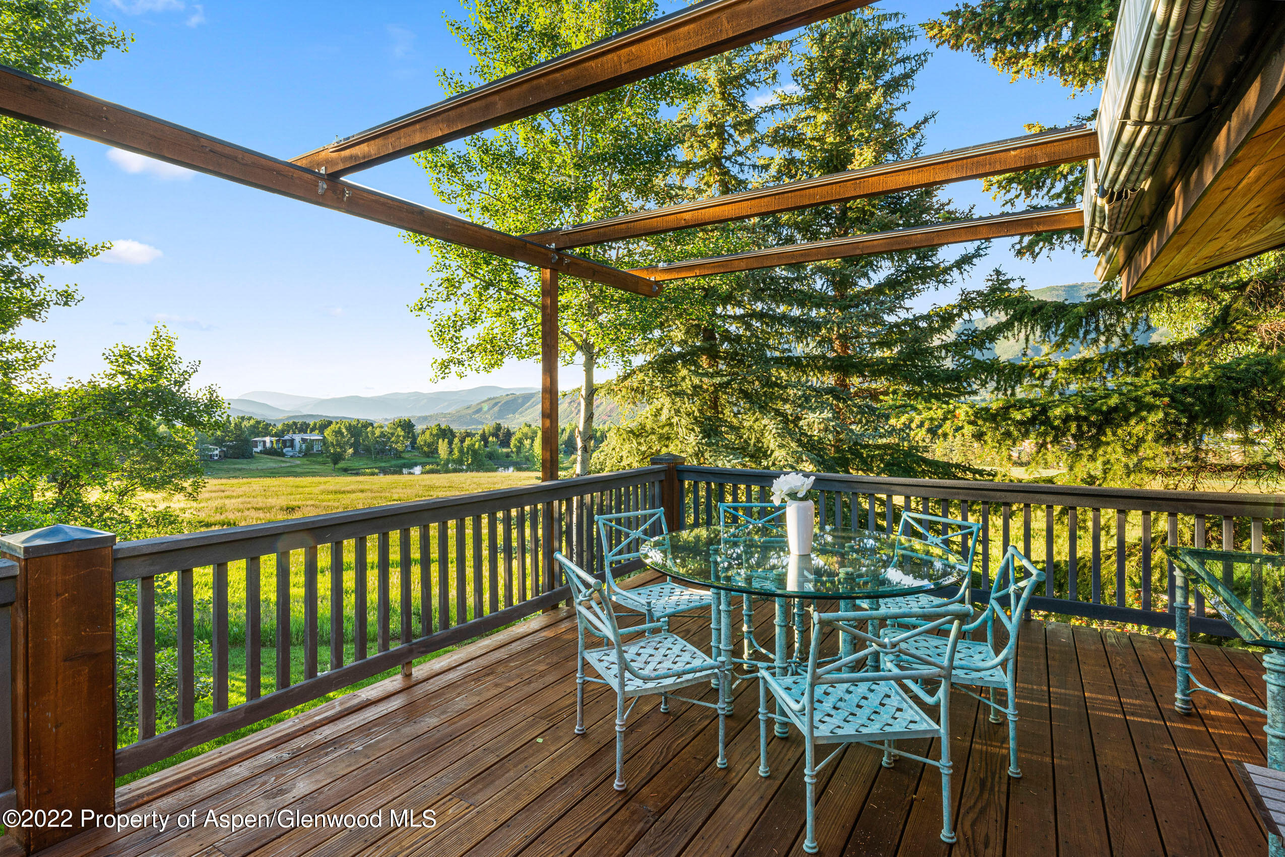 61 Primrose Path Aspen, CO 81611 - Photo 36 of 48 a view of a chairs and table in the balcony