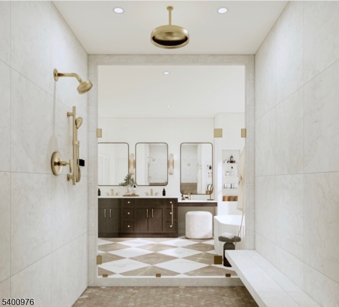 43 Orchard Road Florham Park, NJ 07932 - Photo 25 of 36 a bathroom with a double vanity sink a mirror and bathtub