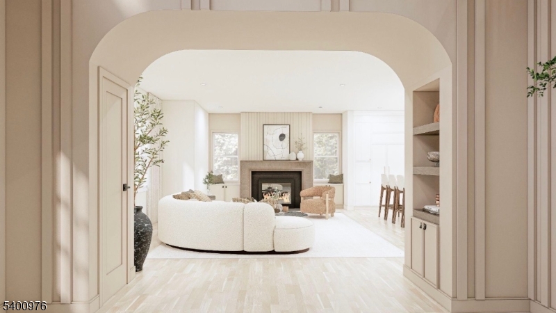 43 Orchard Road Florham Park, NJ 07932 - Photo 6 of 36 a view of a livingroom with a fireplace and painted walls