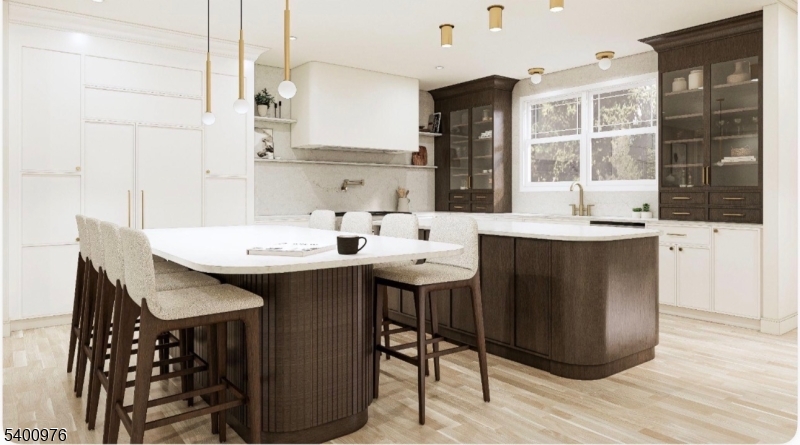 43 Orchard Road Florham Park, NJ 07932 - Photo 9 of 36 a kitchen with a sink and chairs