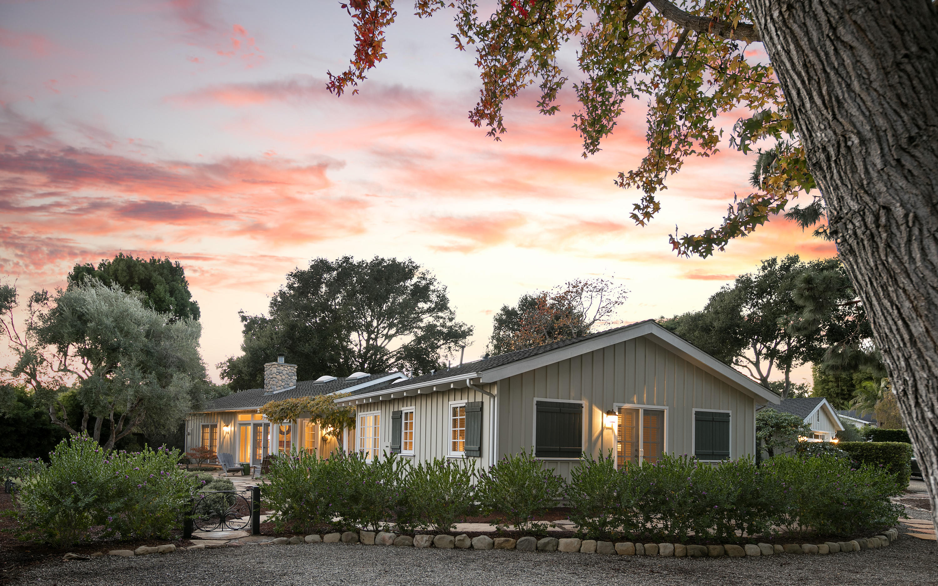 145 La Vereda Road Montecito, CA 93108 - Photo 2 of 17 a front view of a house with a yard
