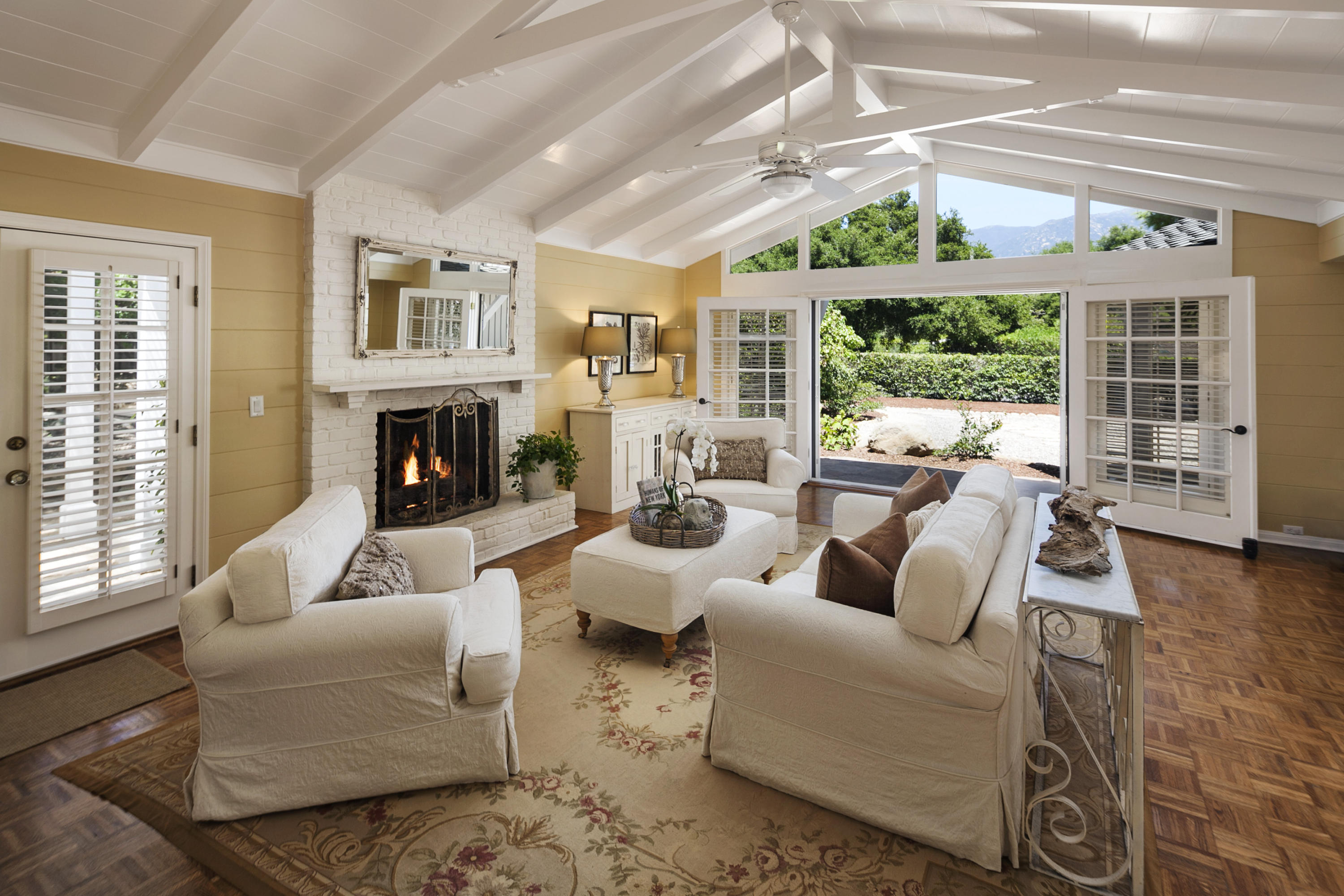 145 La Vereda Road Montecito, CA 93108 - Photo 7 of 17 a living room with furniture and a fireplace