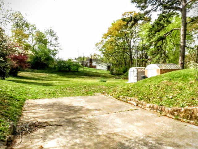 1242 Northern Hills Road Hixson, TN 37343 - Photo 42 of 49 Workshop Driveway View of Backyard