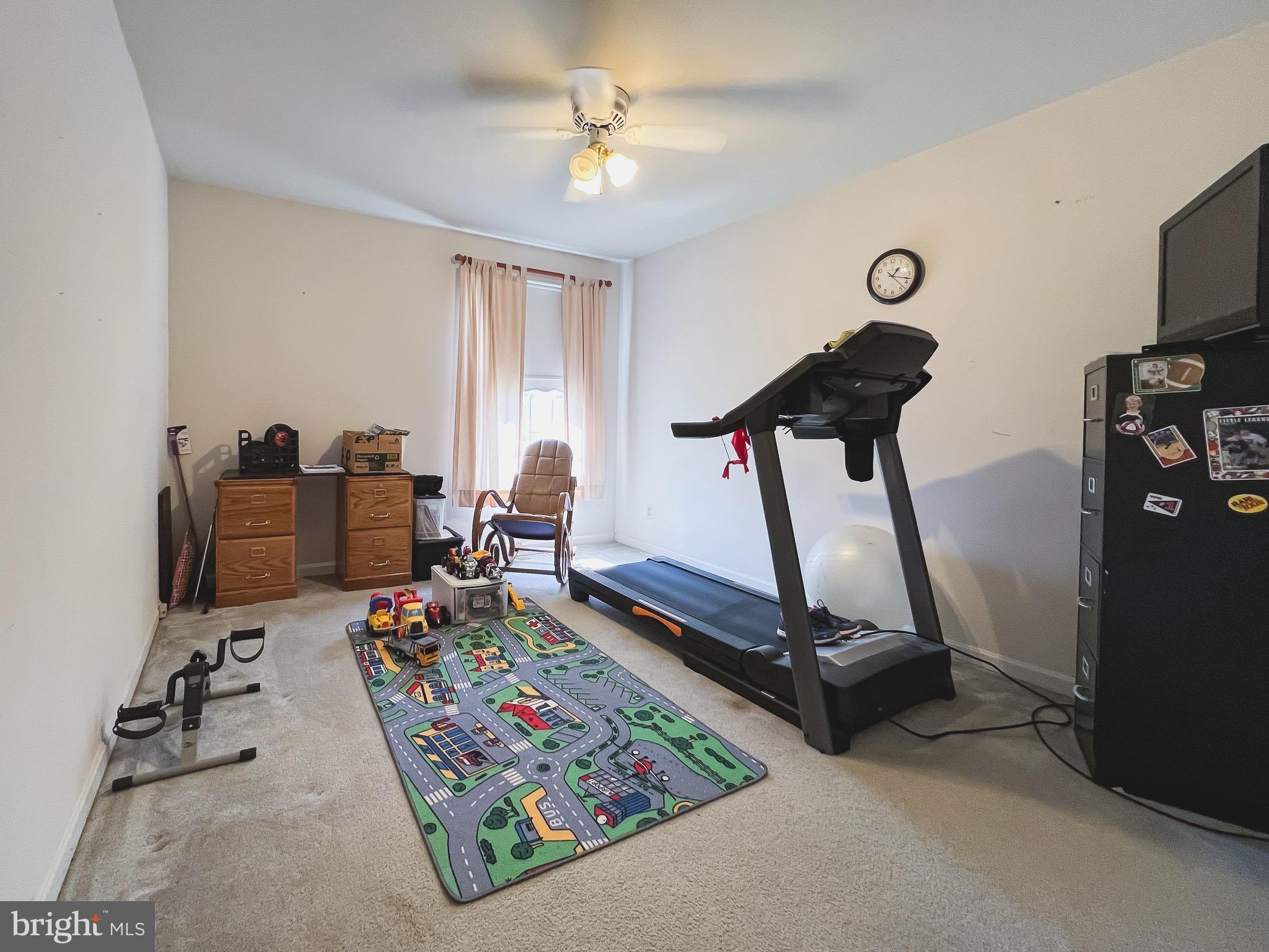890 Carson Road Huntingtown, MD 20639 - Photo 29 of 64 a view of a room with gym equipment