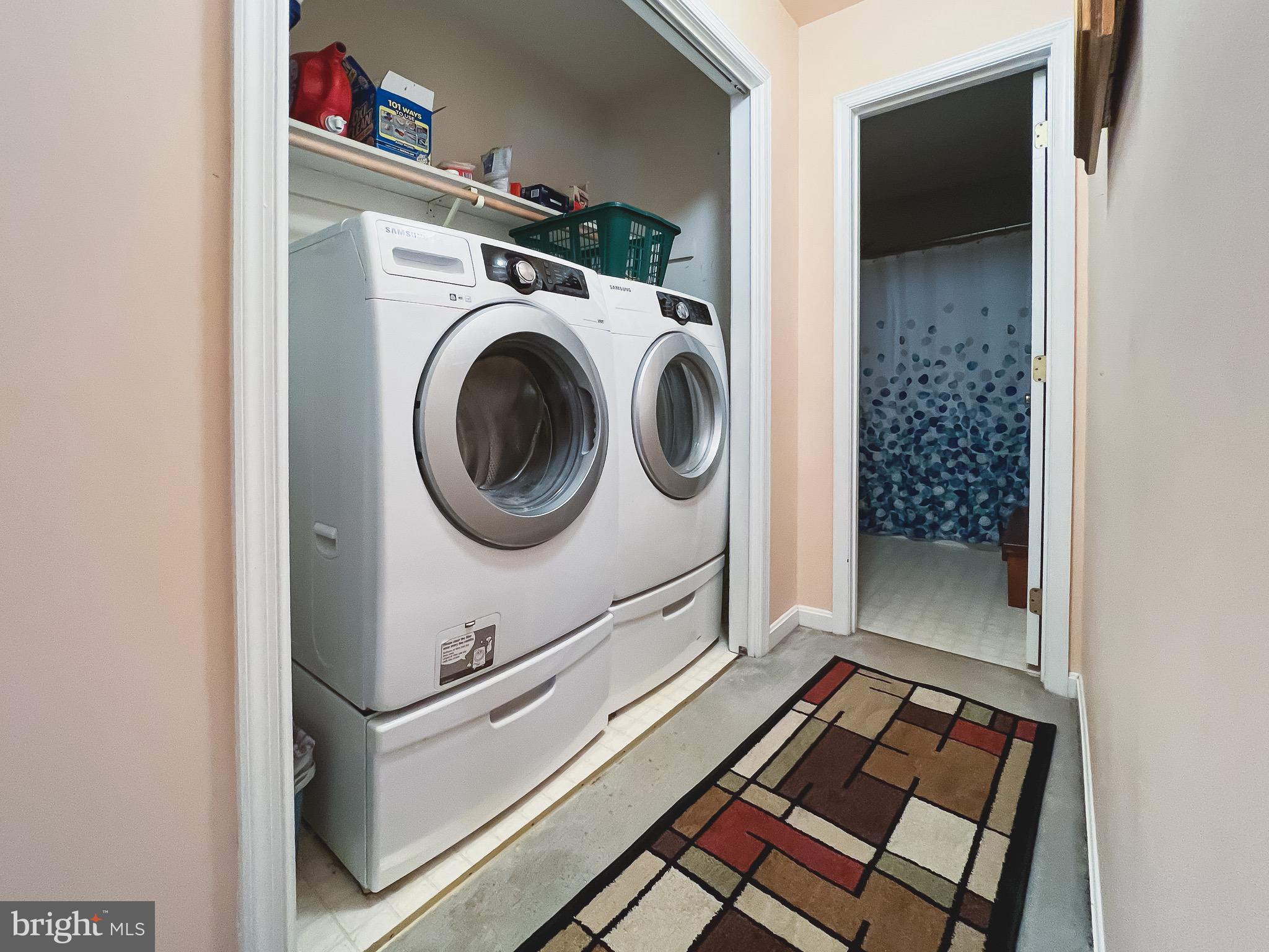 890 Carson Road Huntingtown, MD 20639 - Photo 31 of 64 a utility room with dryer and washer