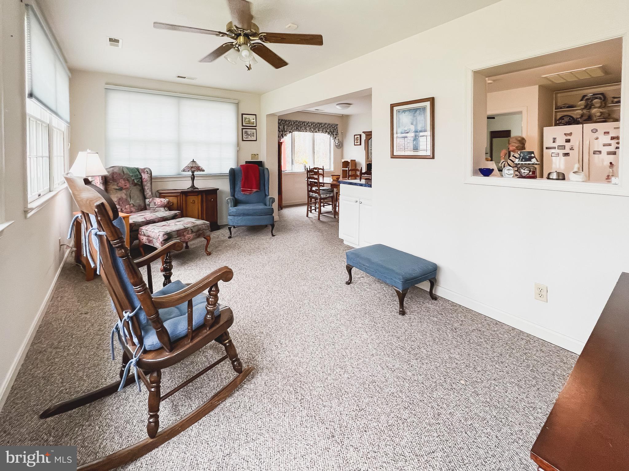 890 Carson Road Huntingtown, MD 20639 - Photo 45 of 64 a living room with furniture a air conditioner vent and a window