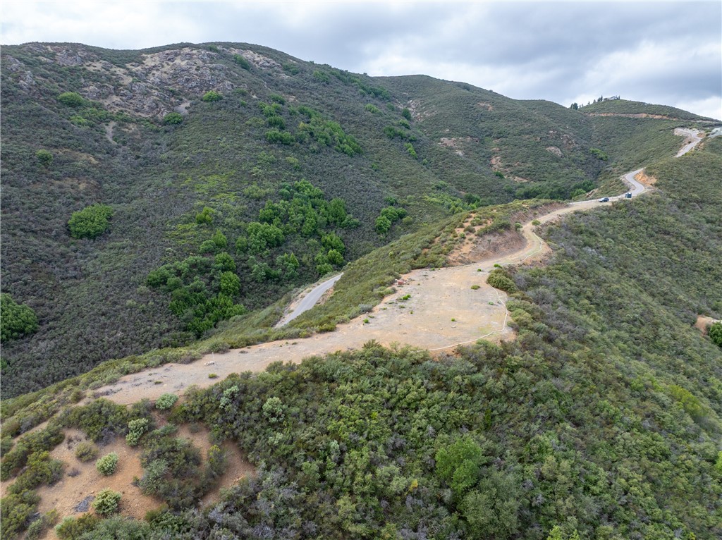 13730 Falcon Road Atascadero, CA 93422 - Photo 27 of 28 a view of a mountain in the distance in front of a building