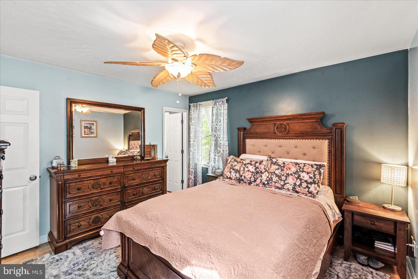 804 Buggy Lane Rochelle, VA 22738 - Photo 20 of 50 a bedroom with a bed and a dresser