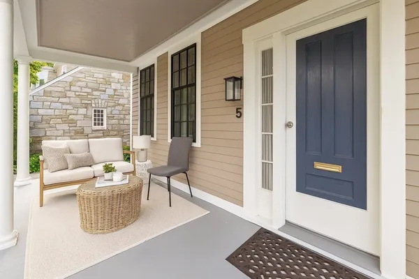 a dining room with furniture and window