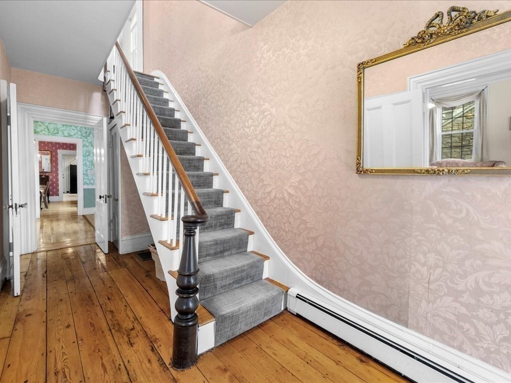 55 Dwight Street Dedham, MA 02026 - Photo 20 of 41 a view of entryway and hall with wooden floor