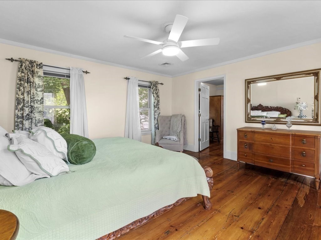 55 Dwight Street Dedham, MA 02026 - Photo 25 of 41 a bedroom with a bed and a dresser