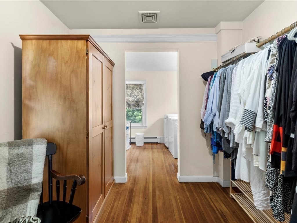 55 Dwight Street Dedham, MA 02026 - Photo 27 of 41 a view of hallway with wooden floor and stairs