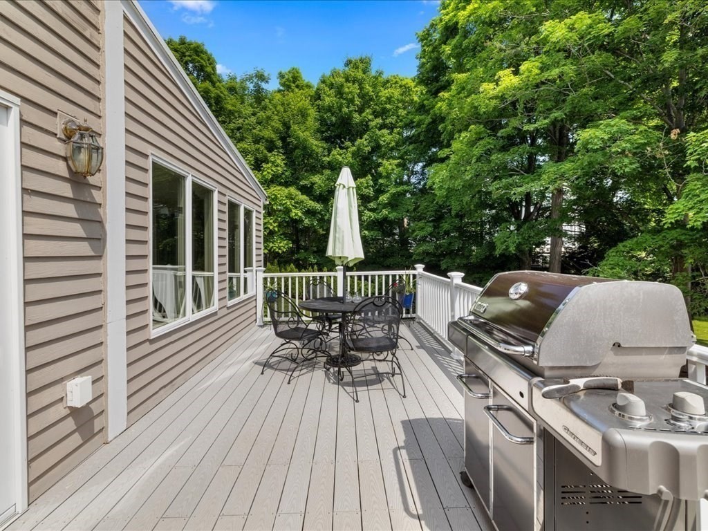 55 Dwight Street Dedham, MA 02026 - Photo 31 of 41 a view of a patio with wooden floor