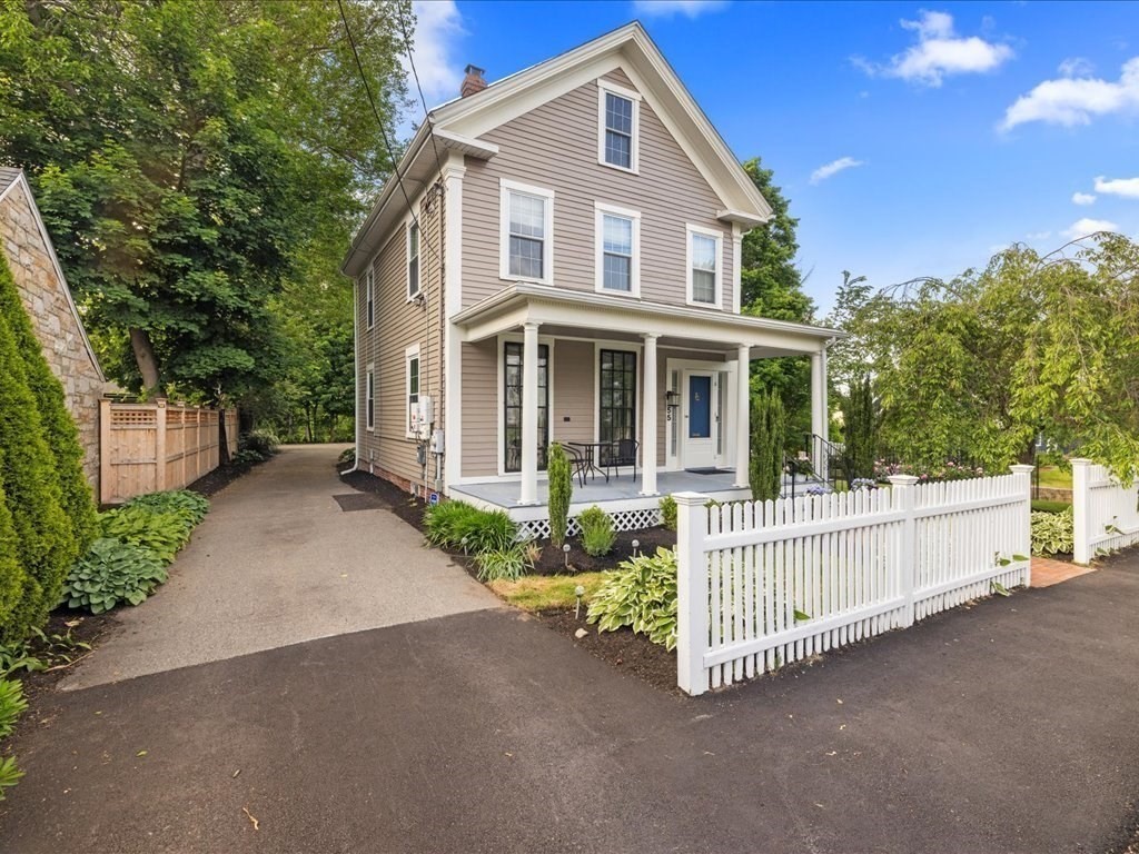 55 Dwight Street Dedham, MA 02026 - Photo 4 of 41 a front view of a house with porch