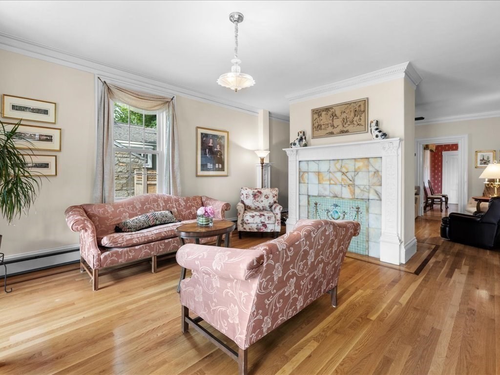 55 Dwight Street Dedham, MA 02026 - Photo 10 of 41 a living room with furniture and a large window