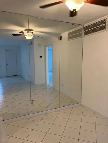 a view of a house with swimming pool and a yard