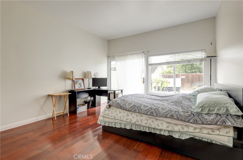 32 Blazing Star Irvine, CA 92604 - Photo 14 of 21 a bedroom with a bed and a table