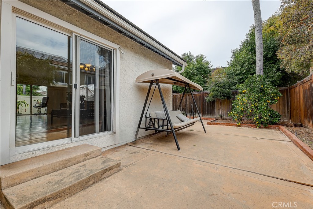 32 Blazing Star Irvine, CA 92604 - Photo 17 of 21 a house with a bench in front of it