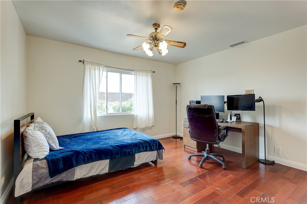 32 Blazing Star Irvine, CA 92604 - Photo 10 of 21 a view of a workspace with furniture and a window