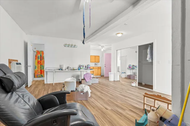 a bathroom with a sink a mirror and cabinets