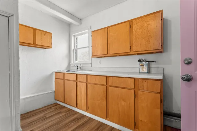 a bathroom with a sink and a curtain