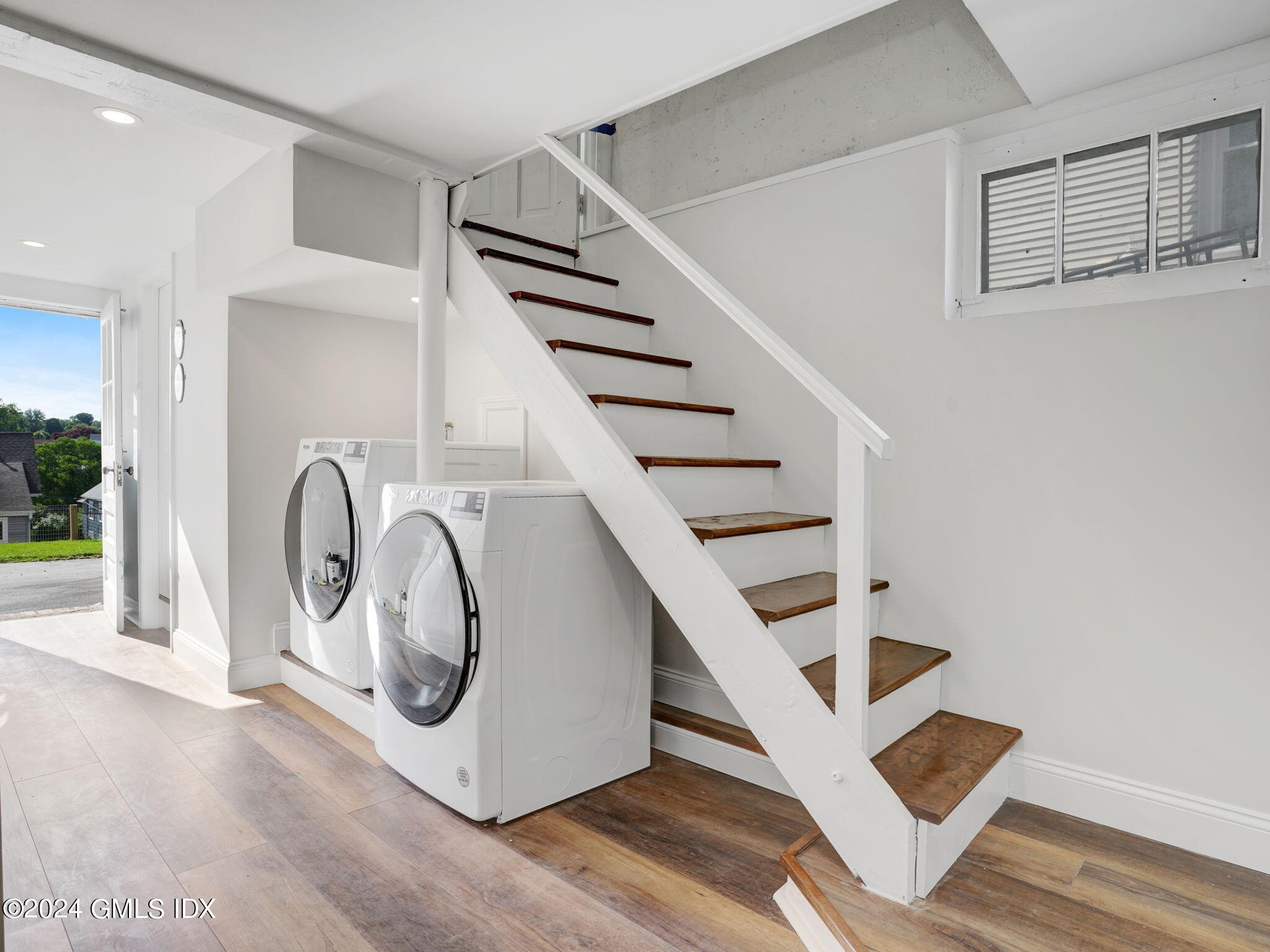 108 Henry Street Greenwich, CT 06830 - Photo 11 of 20 a view of entryway with wooden floor