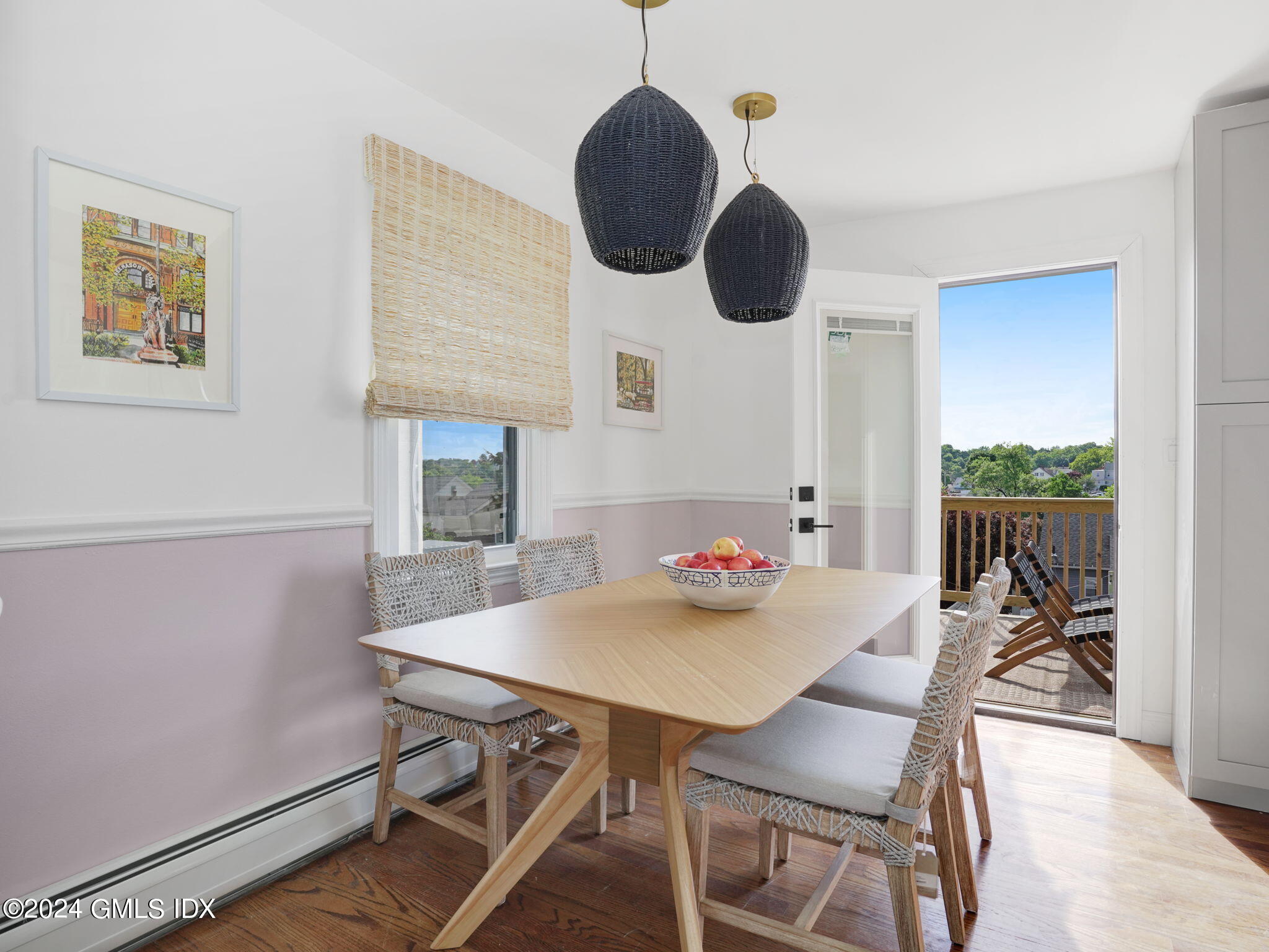 108 Henry Street Greenwich, CT 06830 - Photo 5 of 20 a view of a dining room with furniture and wooden floor