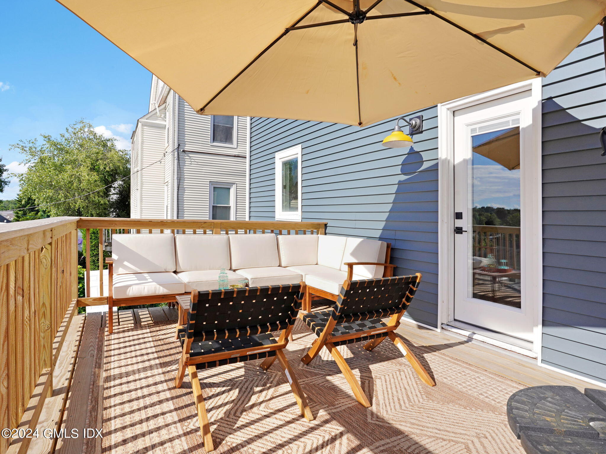 108 Henry Street Greenwich, CT 06830 - Photo 7 of 20 a roof deck view with a sitting space