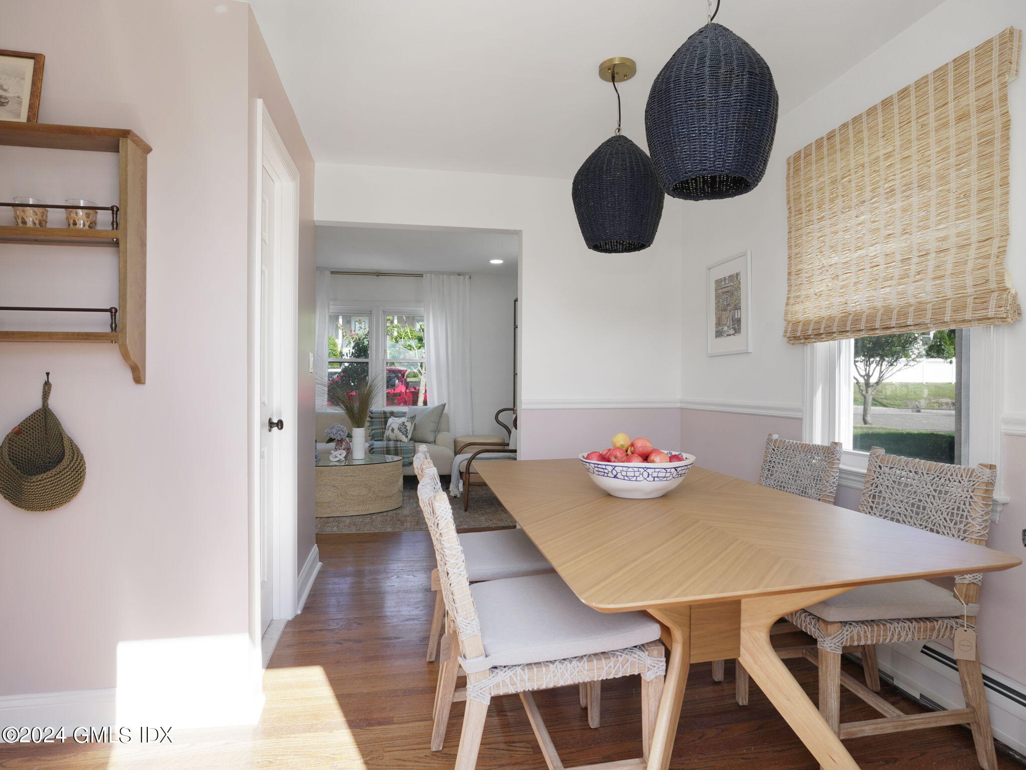 108 Henry Street Greenwich, CT 06830 - Photo 8 of 20 a kitchen with a table chairs a stove and a dining table view