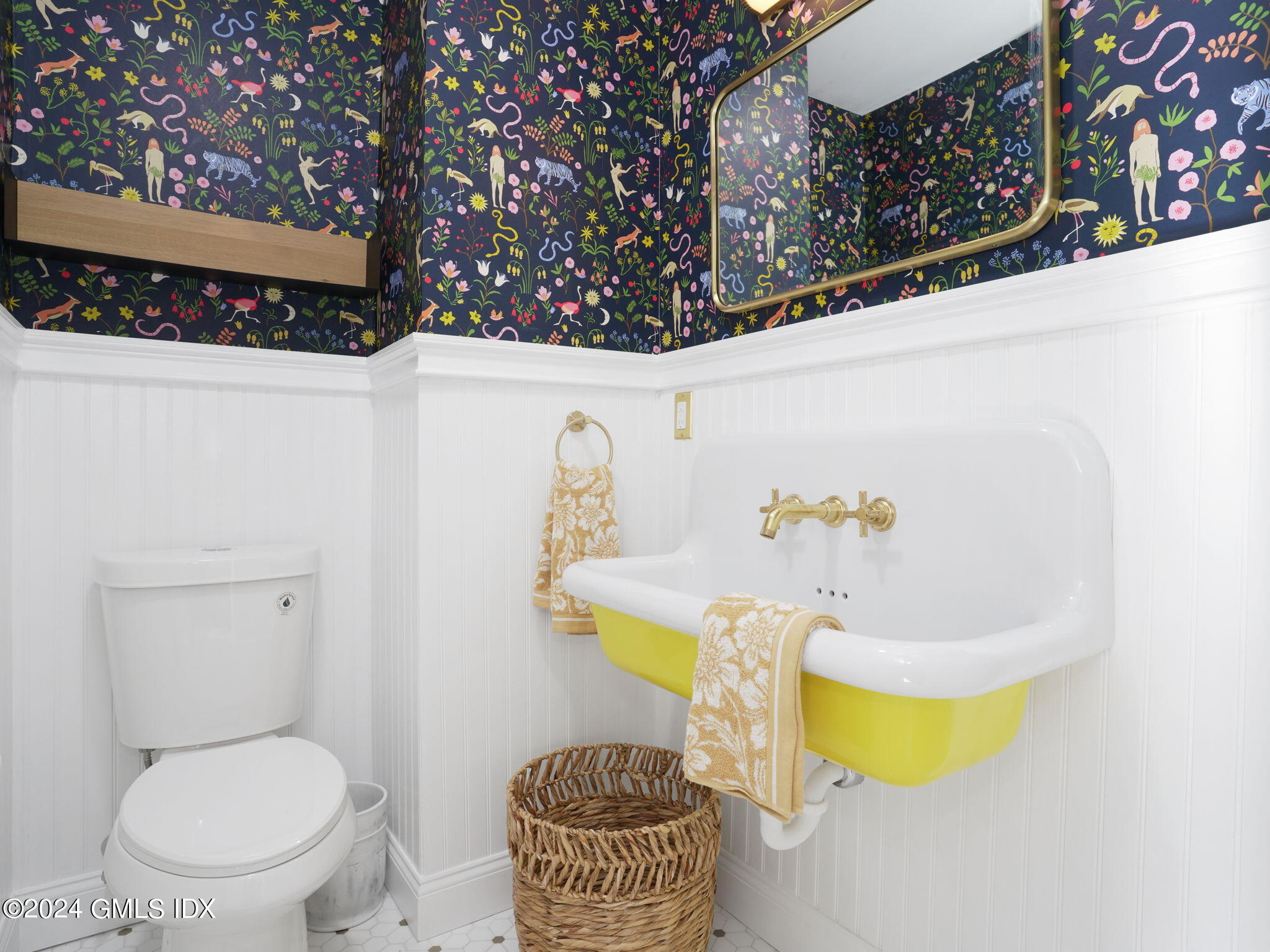 108 Henry Street Greenwich, CT 06830 - Photo 10 of 20 a bathroom with a toilet and a sink