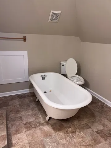a view of a bathtub in a bathroom