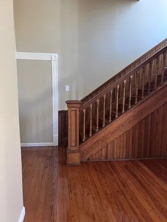 a view of entryway with wooden floor