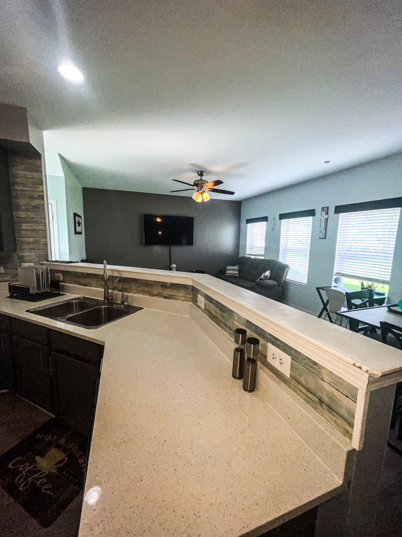 21528 Eich Drive Crest Hill, IL 60403 - Photo 11 of 23 a large kitchen with a sink and stove