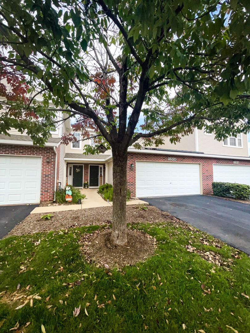 21528 Eich Drive Crest Hill, IL 60403 - Photo 23 of 23 front view of a house with a yard