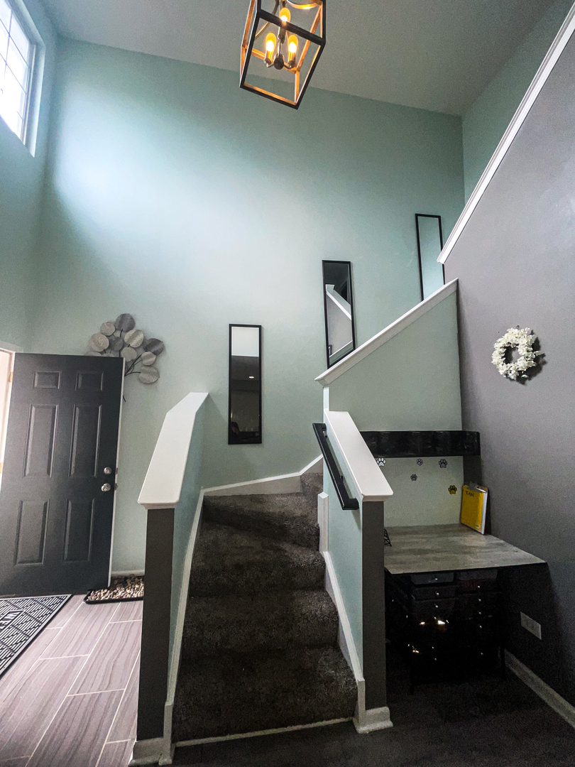 21528 Eich Drive Crest Hill, IL 60403 - Photo 6 of 23 a view of entryway and hall with wooden floor