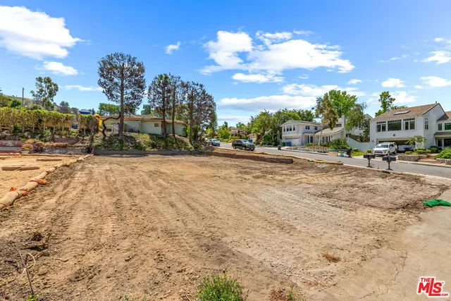 a view of a street with houses
