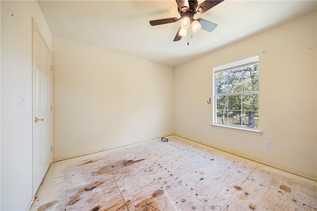 333 Mission River Oaks Road Woodsboro, TX 78393 - Photo 13 of 26 a view of a room that has a window in it